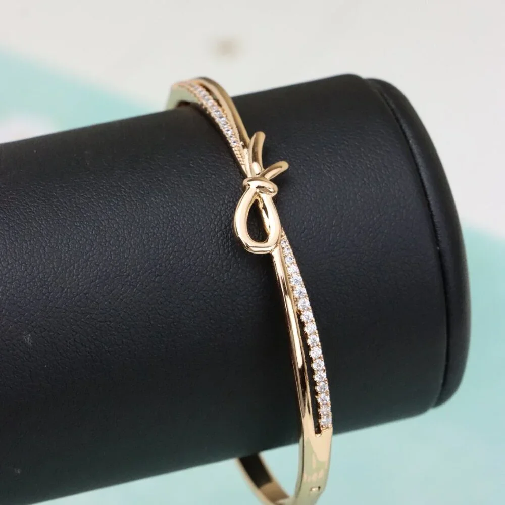 Rose Gold Bow Knot Bangle with Sparkling CZ Accents, XPBL0427